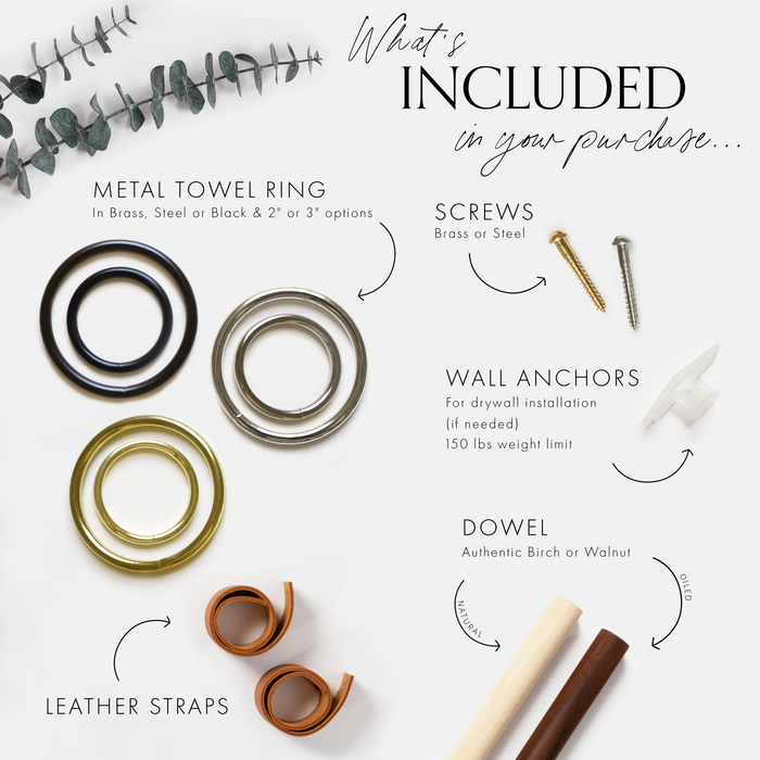 Flat-lay image showing what’s included in the Bathroom Bundle: metal towel rings in black, steel, and brass finishes, brass and steel mounting screws, drywall wall anchors, vegetable-tan leather straps, and two wooden dowels in birch and walnut, styled on a clean white background with eucalyptus accents.