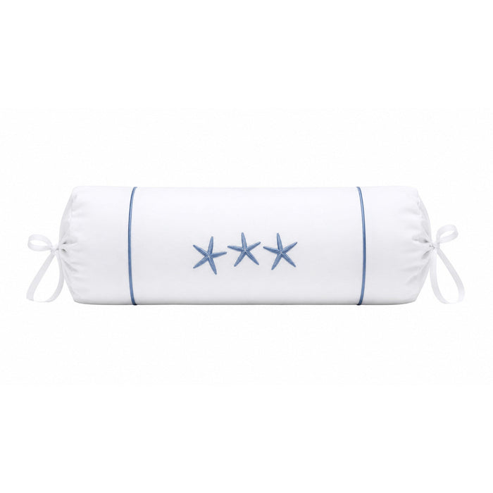 White cylindrical pillow with blue piping and embroidered stars on a white background