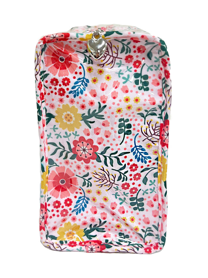 Floral-patterned product packaging on a white background