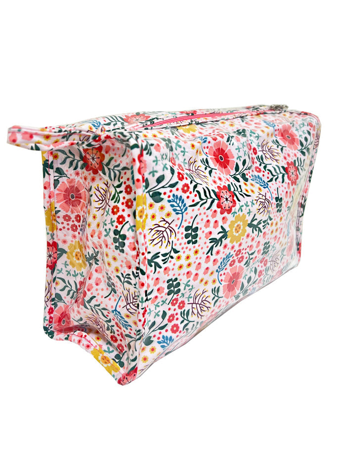 Floral-patterned pouch on a white background