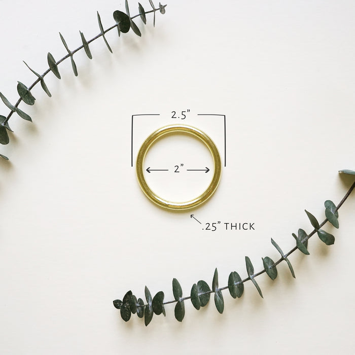 Keyaiira 2-inch brass ring shown with measurements — solid brass ring for towel holder or wall sling, handcrafted hardware with 0.25-inch thickness.