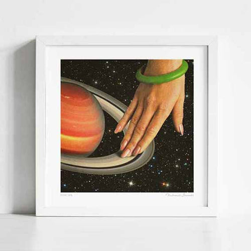 Surreal art print of a hand playing Saturn's rings like a turntable in a starfield. Retro space music wall decor for DJs, music lovers & creatives