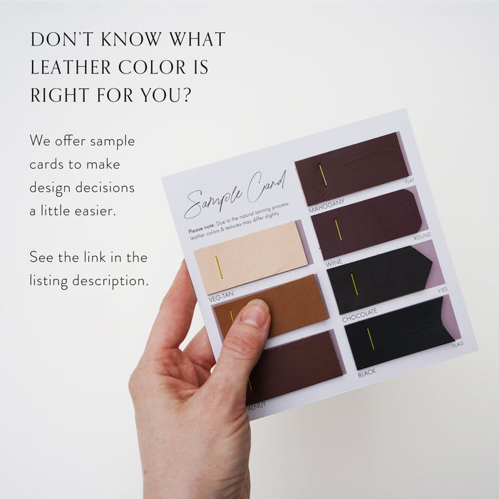 Leather color swatch options for custom wall straps — vegetable-tanned leather finish samples for selecting modern sustainable wall hardware.