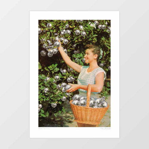 Surreal retro collage art print of a smiling 1960s woman in a pastel dress picking shimmering mirrored disco balls from trees into a wicker basket – Disco Ball Grove by Vertigo Artography