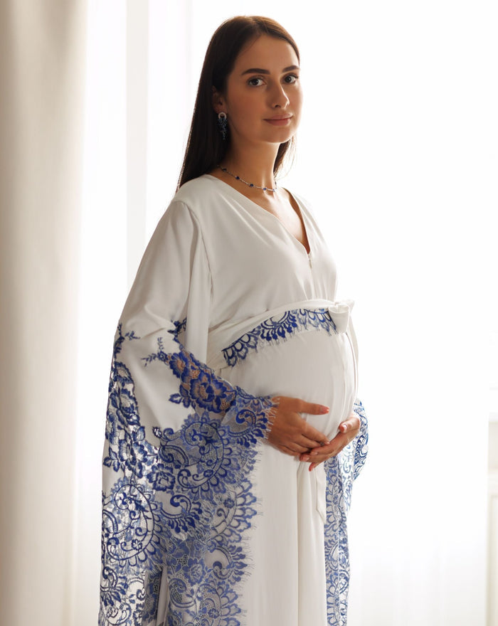 A side profile shot of a Maternity Kaftan from head to knees, featuring a loose fit for pregnancy comfort.