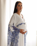 A side profile shot of a Maternity Kaftan from head to knees, featuring a loose fit for pregnancy comfort.
