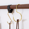 Solid wood wall rail with brass S-hook and leather hanging loop — modern wall-mounted storage solution for kitchen tools, towels, and everyday essentials.