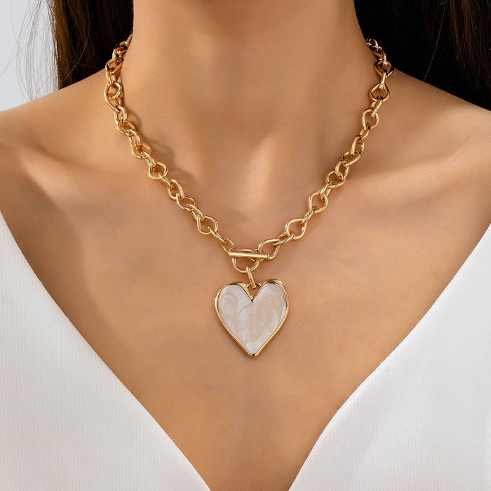 JOSSLYN by wall to wall - White Inlay Heart Toggle Necklace