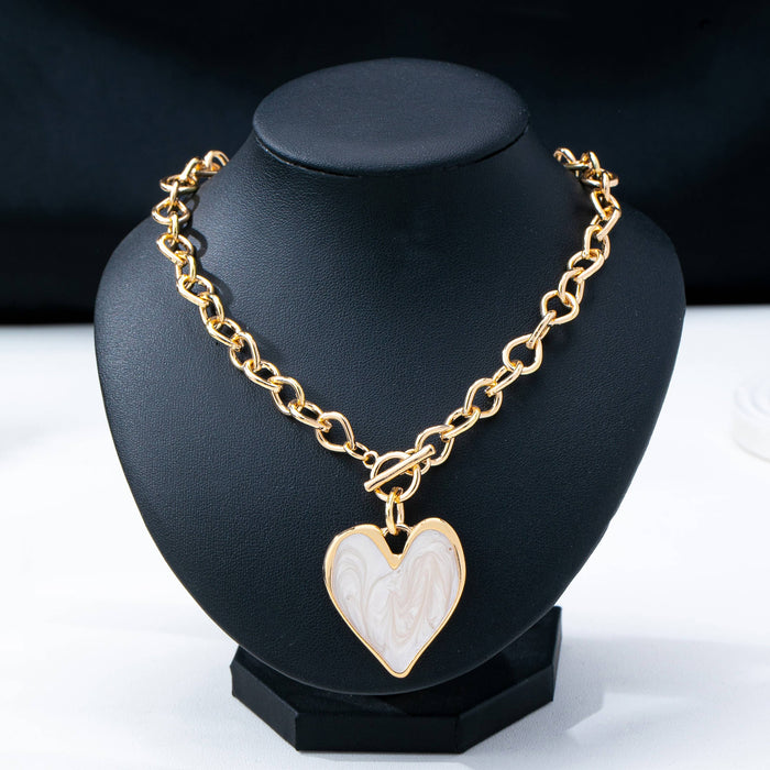 JOSSLYN by wall to wall - White Inlay Heart Toggle Necklace