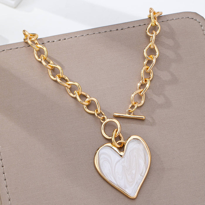JOSSLYN by wall to wall - White Inlay Heart Toggle Necklace