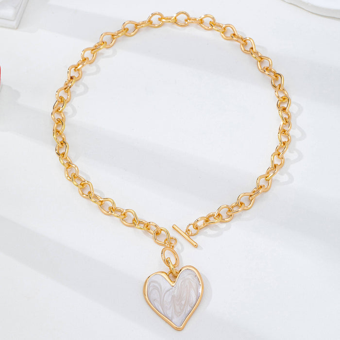 JOSSLYN by wall to wall - White Inlay Heart Toggle Necklace