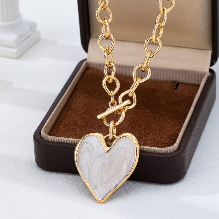 JOSSLYN by wall to wall - White Inlay Heart Toggle Necklace