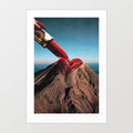 Surreal art print — giant red lipstick applying a crimson heart to a snow-dusted volcano peak against a blue sky, glamour meets geology wall art by Vertigo Artography