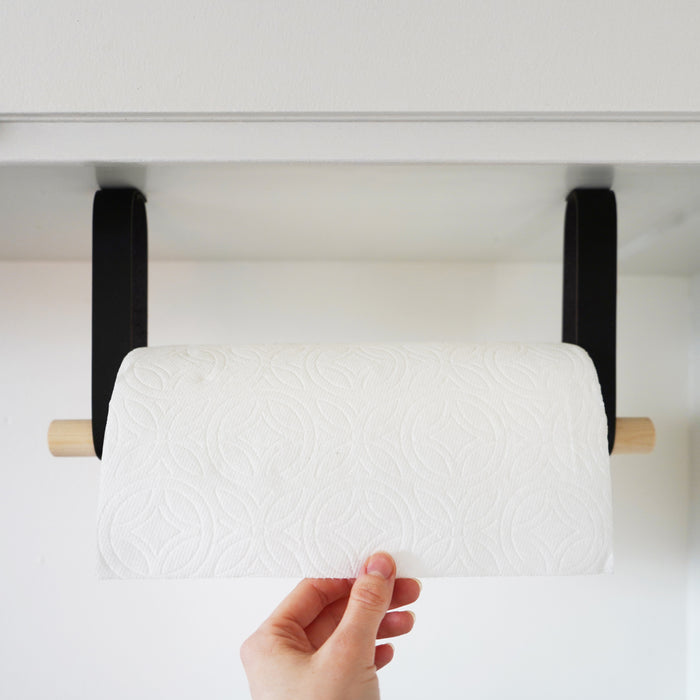 Cabinet Mounted paper towel holder with leather straps and wood dowel — modern farmhouse kitchen organizer with black leather brackets and minimalist design.