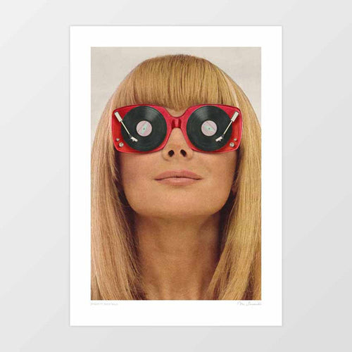 Red Vinyl Sunglasses surreal art print — woman wearing oversized red frame sunglasses with spinning vinyl record turntable lenses and needle arms, retro 1960s pop art music wall art for eclectic interiors and music lovers