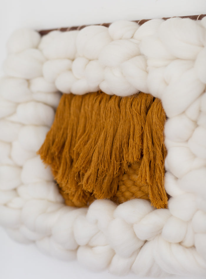 Macro view of layered wool fibers in Sesame Cloud art piece — handcrafted modern fiber wall decor with soft sculptural texture.