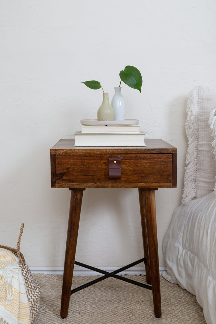 Keyaiira mahogany leather wide pull installed on a walnut drawer, styled next to trailing greenery, rich handcrafted accent for warm natural interiors.