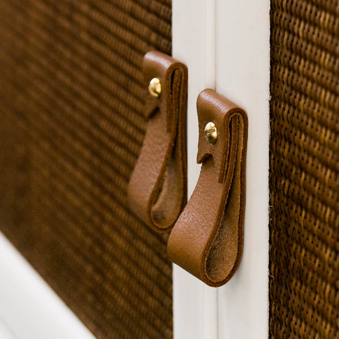 Close-up of Keyaiira small leather pulls with brass hardware hand-finished leather cabinet handles showcasing fine craftsmanship and texture.
