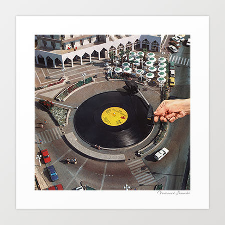 Surreal retro collage art print of a city roundabout transformed into a spinning vinyl record under a turntable stylus — music wall art