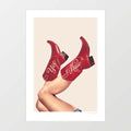 These Boots Yeehaw Rustic Red and Neutral art print — bare tanned legs kicked up wearing deep cherry red mid-calf cowboy boots with cream cursive Yee Haw script lettering across the shaft against a soft warm cream neutral background, cowgirl core western art print for Nashville bachelorette ranch Airbnb hotel lobby and rodeo interiors