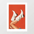 Surreal art print of white cowgirl boots with legs kicked in the air against a rich burnt orange terracotta background – These Boots Burnt Orange by Vertigo Artography