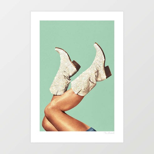 Surreal art print of white glitter cowboy boots with legs kicked in the air against a sage green background – These Boots Glitter Green by Vertigo Artography