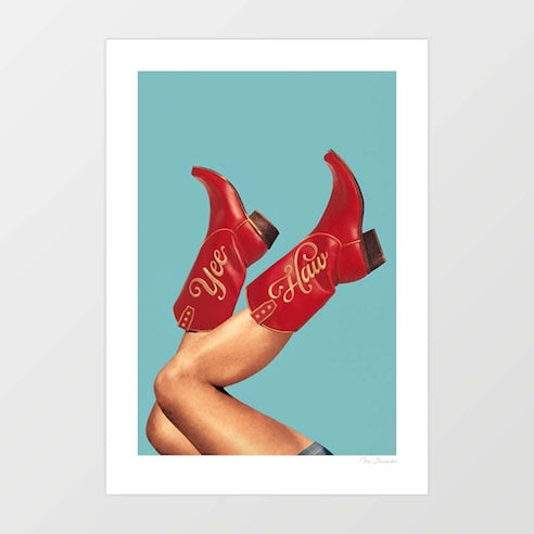 Surreal art print of cherry red cowgirl boots with Yeehaw script kicked in the air against a teal blue background – These Boots Yeehaw Cherry Red by Vertigo Artography