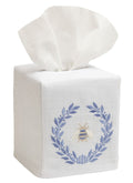 Tissue box cover with embroidered design on a white background