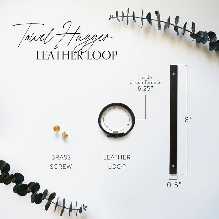 Keyaiira Towel Hugger leather loop set with brass screw and measurement details shown on white background with eucalyptus accent. Includes 8-inch leather strap and 6.25-inch circumference ring for modern kitchen towel hanging.