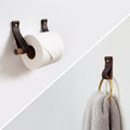 Keyaiira leather towel ring and toilet paper holder bundle mounted on a neutral wall. Handcrafted leather with brass hardware adds modern warmth and minimal style to bathroom decor.