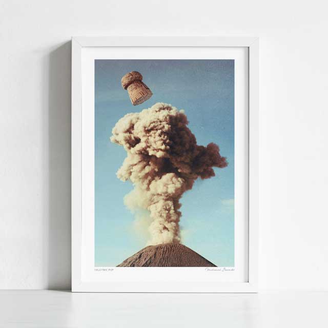 Volcanic Pop art print framed view — surreal champagne volcano collage poster with retro aesthetic, statement wall art for foodies and party spaces