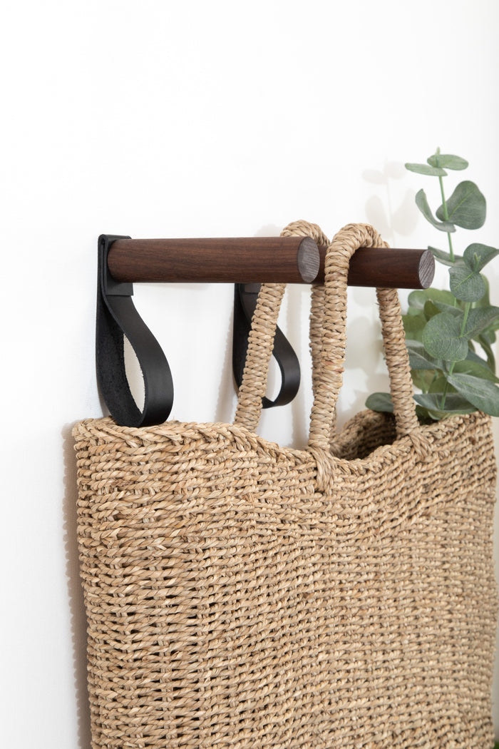 Keyaiira Leather Wall Peg sizing chart showing measurements and material details — handcrafted leather strap with wooden dowel peg, available in birch or walnut wood.